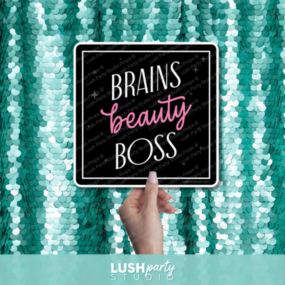 women empowerment photo prop sign with 'Brains beauty BOSS' text by Lush Party Studio